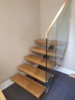 floating stairs with glass
